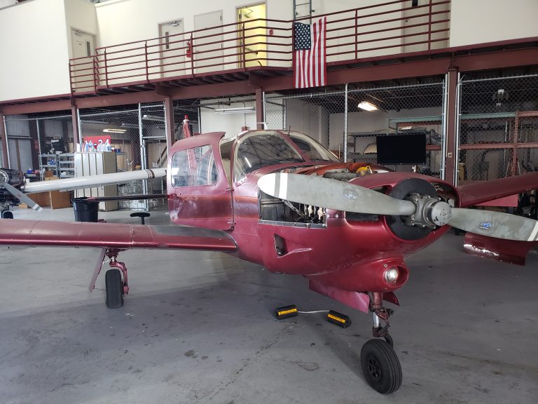 Red Piper Turbo Arrow undergoing maintenance